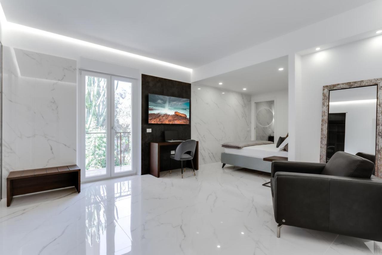Caralis Suites Rooms Кальяри Экстерьер фото