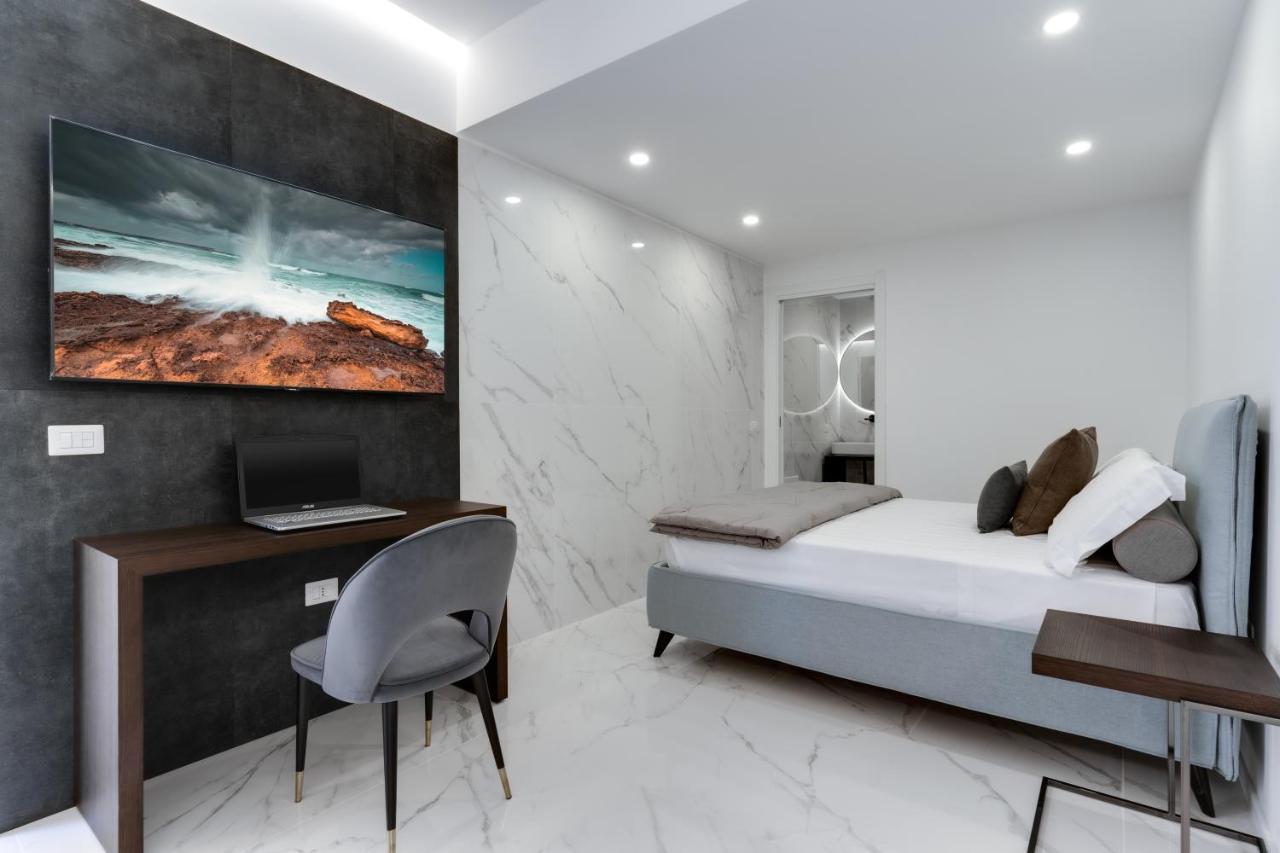 Caralis Suites Rooms Кальяри Экстерьер фото